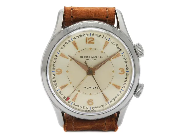 RECORD WATCH Co. Genève, herrur, 34,5 mm, Cal AS 1475, Serie nr. 1082733, Boett 4023, stål, manuell, plexiglas, alarm, läderband, ca 1955.
