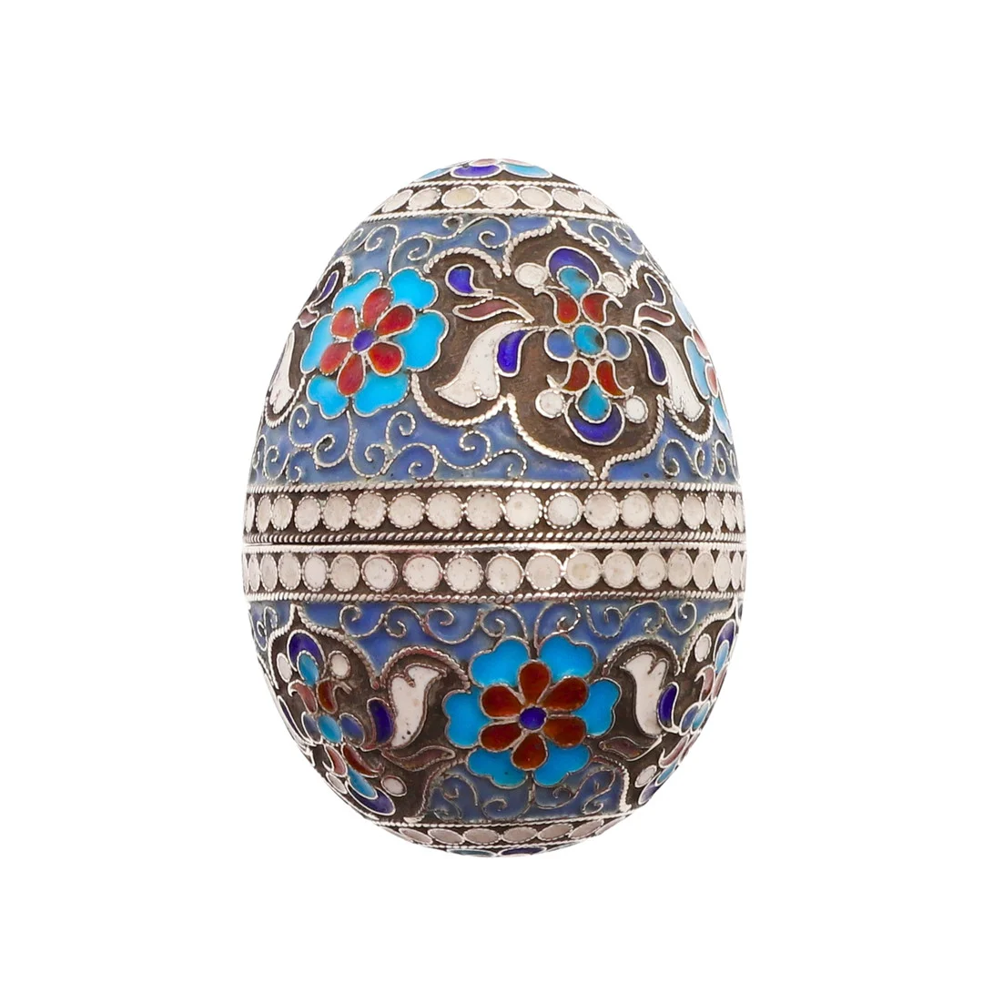 A LATE 19TH/EARLY 20TH CENTURY RUSSIAN SILVER AND ENAMEL TWO-PART DECORATIVE EGG. — Silver — Lawrences Auctioneers