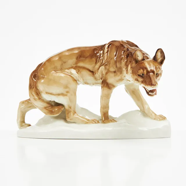 WALDEMAR LINDSTRÖM. Varg, figurin i glaserat porslin, Rörstrand, 1900-talets början.