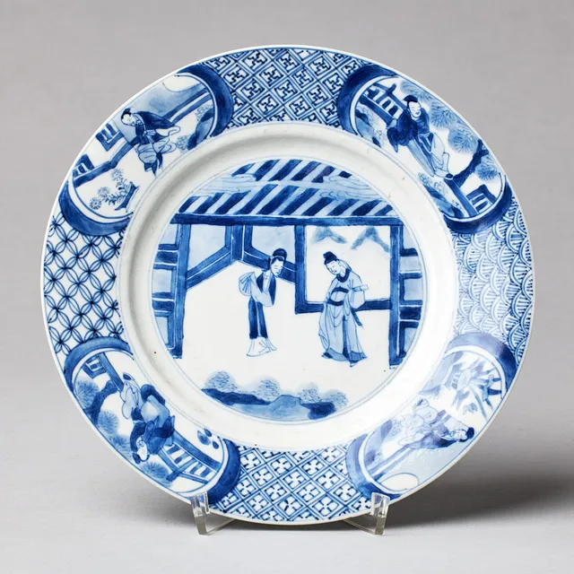 A BLUE AND WHITE DISH.