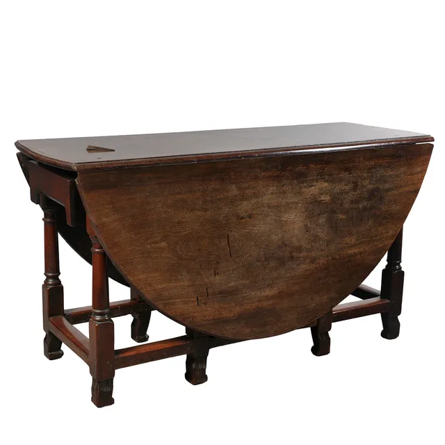 A RARE WILLIAM AND MARY BULLETWOOD GATELEG TABLE.
