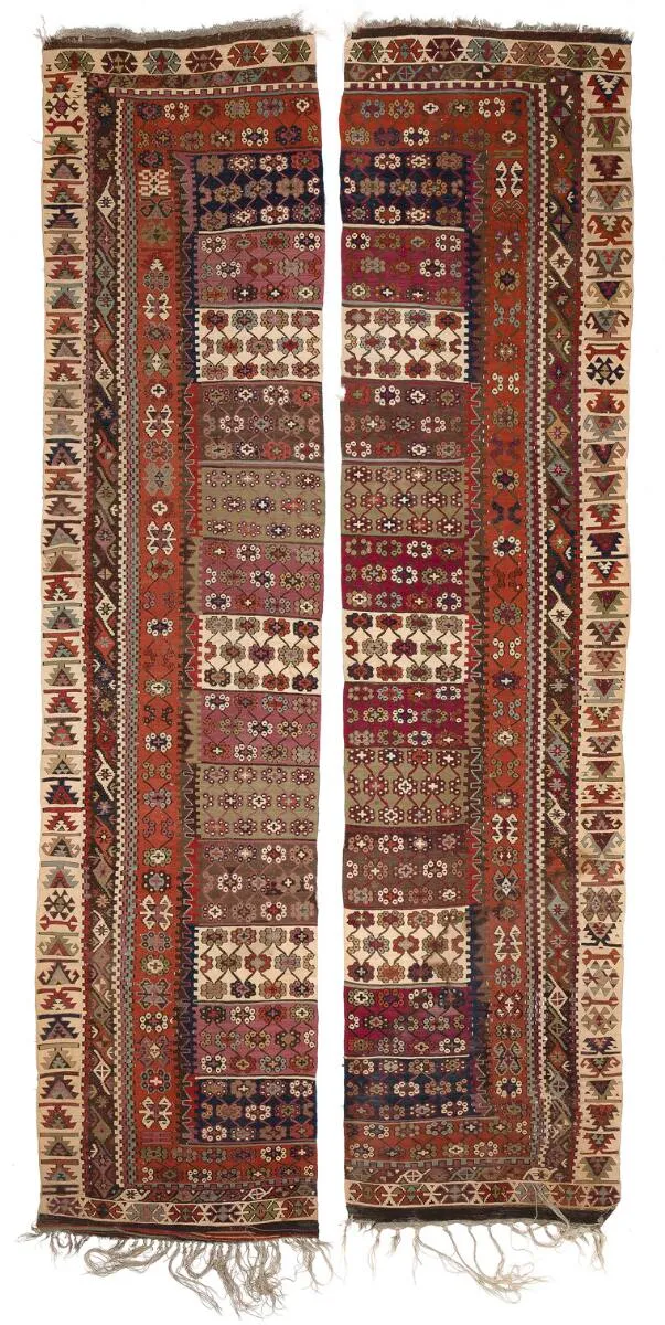 An antique Turkish kelim woven in two lanes. 19th century. 160×345 cm.