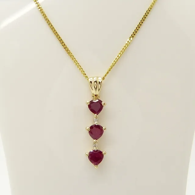 HEART SHAPED RUBY & DIAMOND NECKLACE.