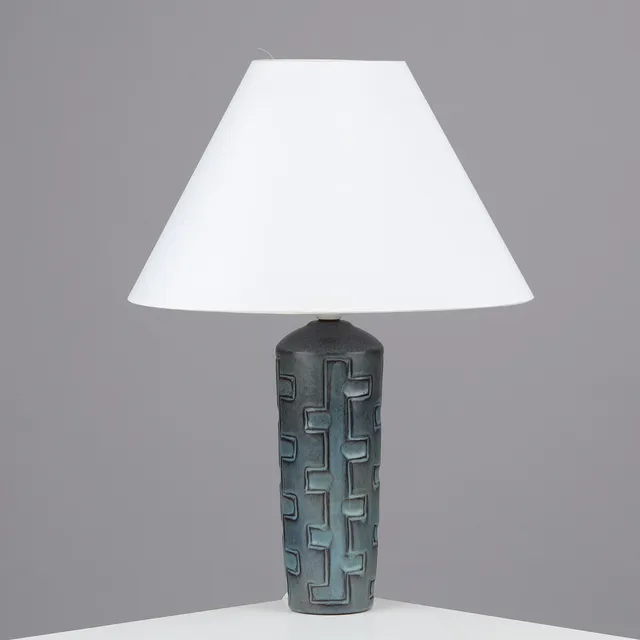 HELGE ØSTERBERG (1905-82). Table lamp of blue-glazed ceramics with geometric reliefs, own workshop, Denmark, dated 1965.