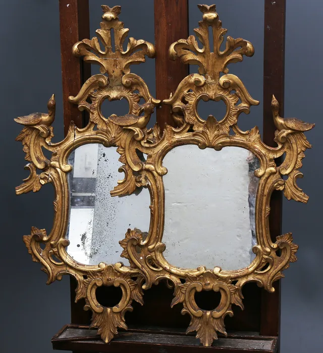 Pair of Charles III ornamental mirrors in carved and gilt wood, third quarter of the 18th Century.