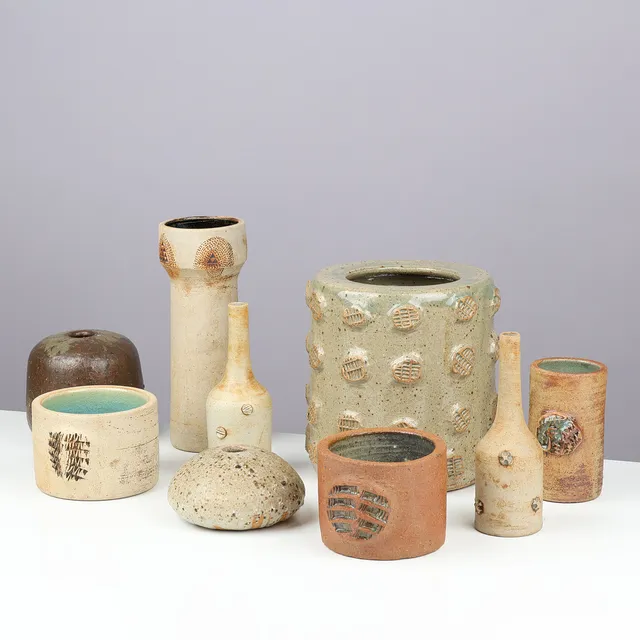 CONNY WALTHER (1931-2019). Collection of nine hand-thrown vases in brutalist style, partly glazed stoneware with reliefs, own studio, Denmark, 1960/70s, (9).