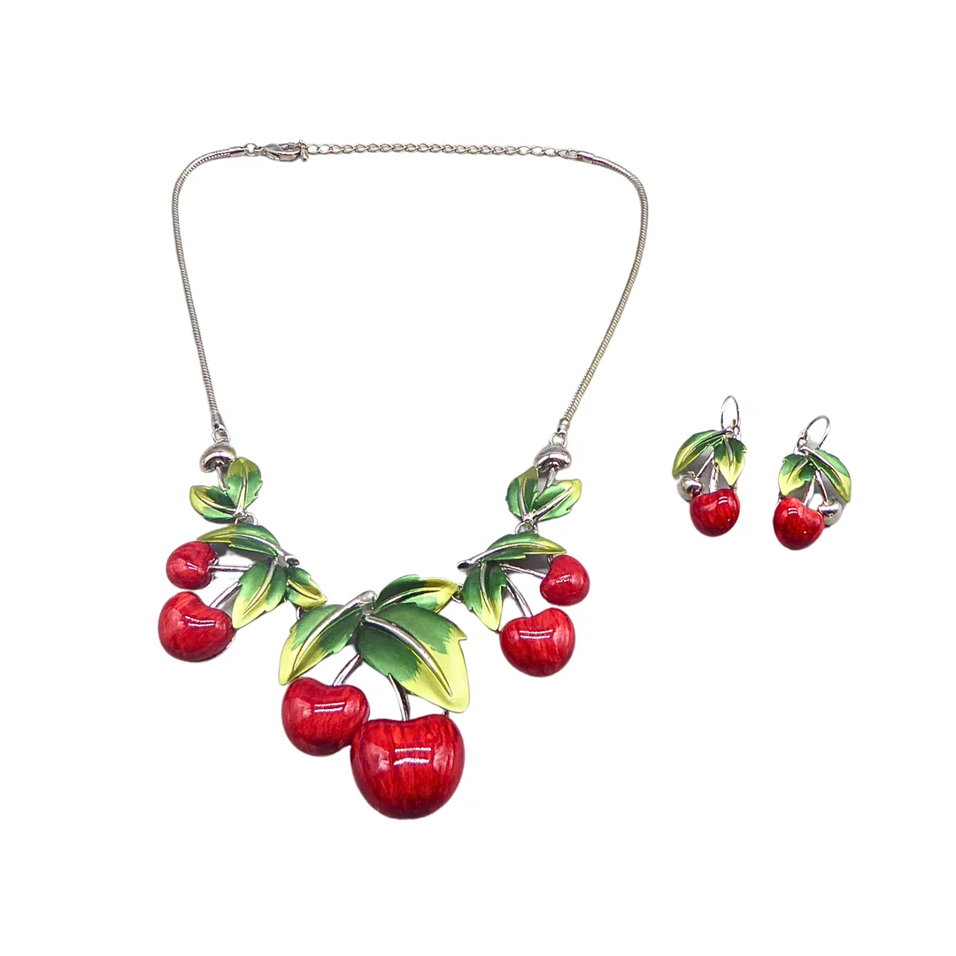 MODESCHMUCKSET „KIRSCHEN“ AUS HALSKETTE UND OHRRINGEN. — Jewellery — Auktionshaus Stuber's Hammerschlag