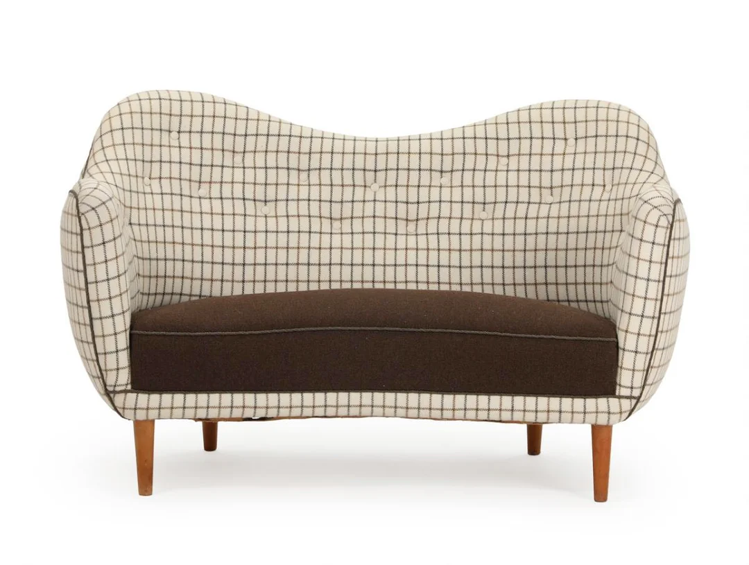 “BO 55”. Freestanding two seater sofa with beech legs. Sides, seat and back upholstered with brown and checkered fabric, fitted with buttons. Designed 1946. Manufactured by Bovirke. L. 130 cm. — Modern Furniture — Bruun Rasmussen