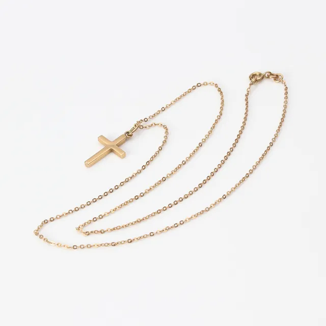 HALSBAND. 14k guld, ankarlänk med hänge i form av ett kors, vikt ca 2,2 gram.