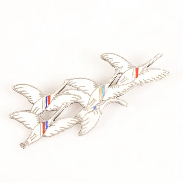 ERIK MAGNUSSON. Brosch, sterlingsilver med emaljerad dekor, Dragsted, Danmark.