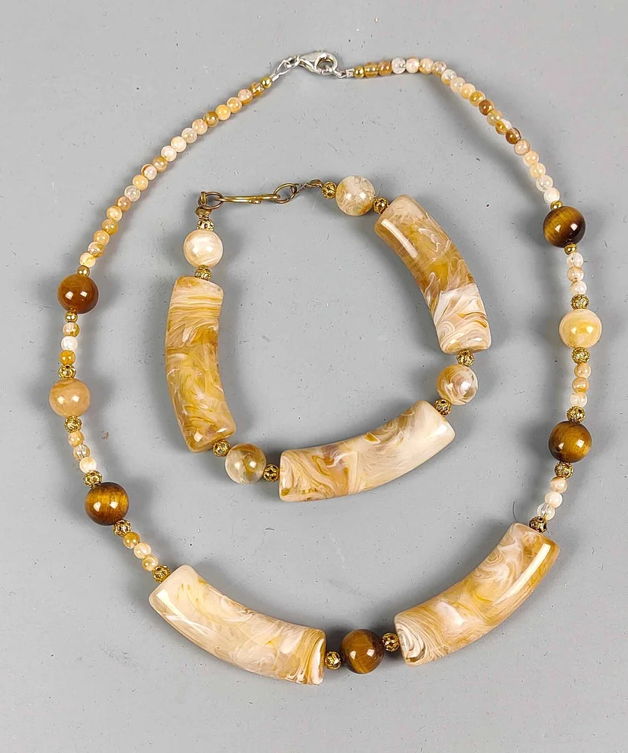 ART DEKO COLLIER UND ARMBAND. — Jewellery Suites — Auktionshaus Bossard