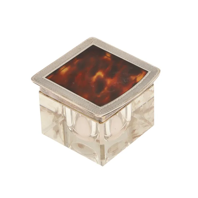 A SILVER AND TORTOISESHELL MOUNTED INKWELL.