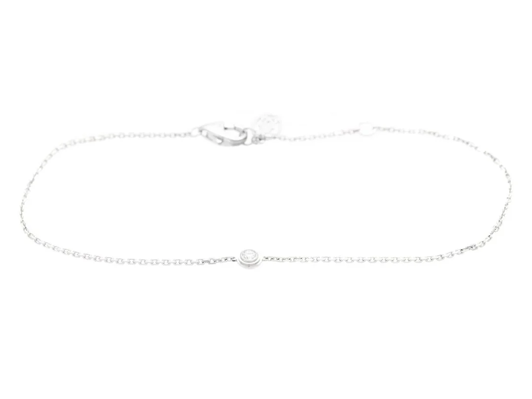 CARTIER, armband, d'Amour, minimodell, 18K vitguld, briljantslipad diamant ca 0,04 ct, ca TW/VS, serienummer WTZ314, längd 16,5-18,5 cm, vikt 1,5 g, certifikat, originaletui, ytterkartong. — Smycken/Armband — Kaplans