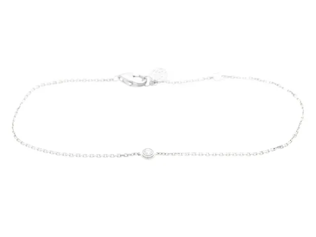 CARTIER, armband, d'Amour, minimodell, 18K vitguld, briljantslipad diamant ca 0,04 ct, ca TW/VS, serienummer WTZ314, längd 16,5-18,5 cm, vikt 1,5 g, certifikat, originaletui, ytterkartong.