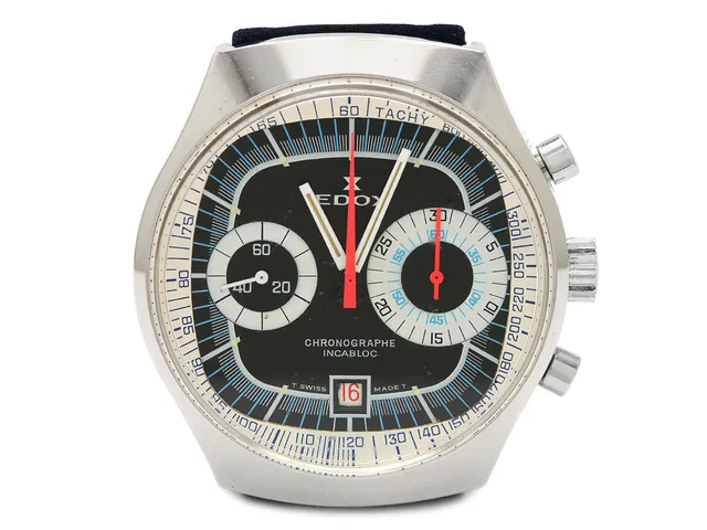 EDOX, kronograf, "Tachy", Cal Valjoux 7734, Boett nr. 6000, herrur, 40 mm, vitmetall, manuell, plexiglas, datum, läderband, originalspänne, hängetikett, ca 1970.