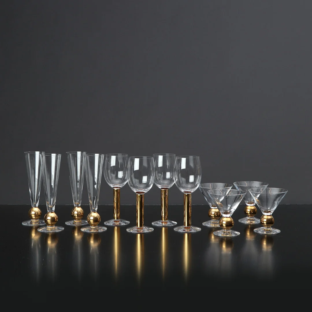 GUNNAR CYRÉN. SERVISDELAR, 12 ST. Glas med förgylld dekor. "Nobel", Orrefors. — Tableware — Skånes Auktionsverk