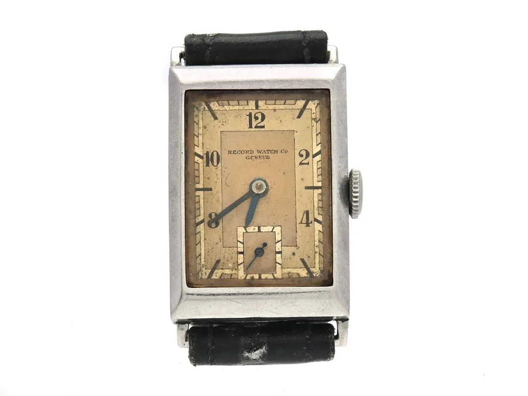 Record Watch Co. Geneve Ø20mm manuell boett nr. 1920, Art Deco 1930-tal, tankmodell med slitet läderband. — Klockor/Record — Kaplans