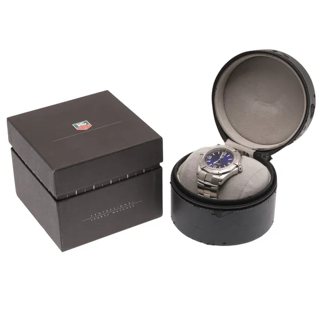 A GENTLEMAN'S STAINLESS STEEL PROFESSIONAL WRISTWATCH BY TAG HEUER.