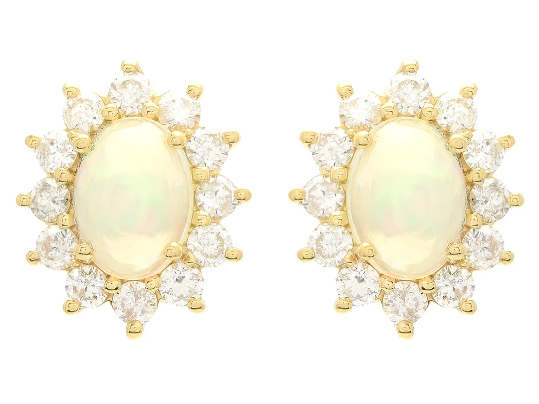 ÖRHÄNGEN, 18K guld, opaler ca 1,28 ctv, briljantslipade diamanter ca 1,06 ctv, ca W-Cr(H-J)/SI-P, vikt 3,9 g, stift. — Smycken/Örhängen — Kaplans