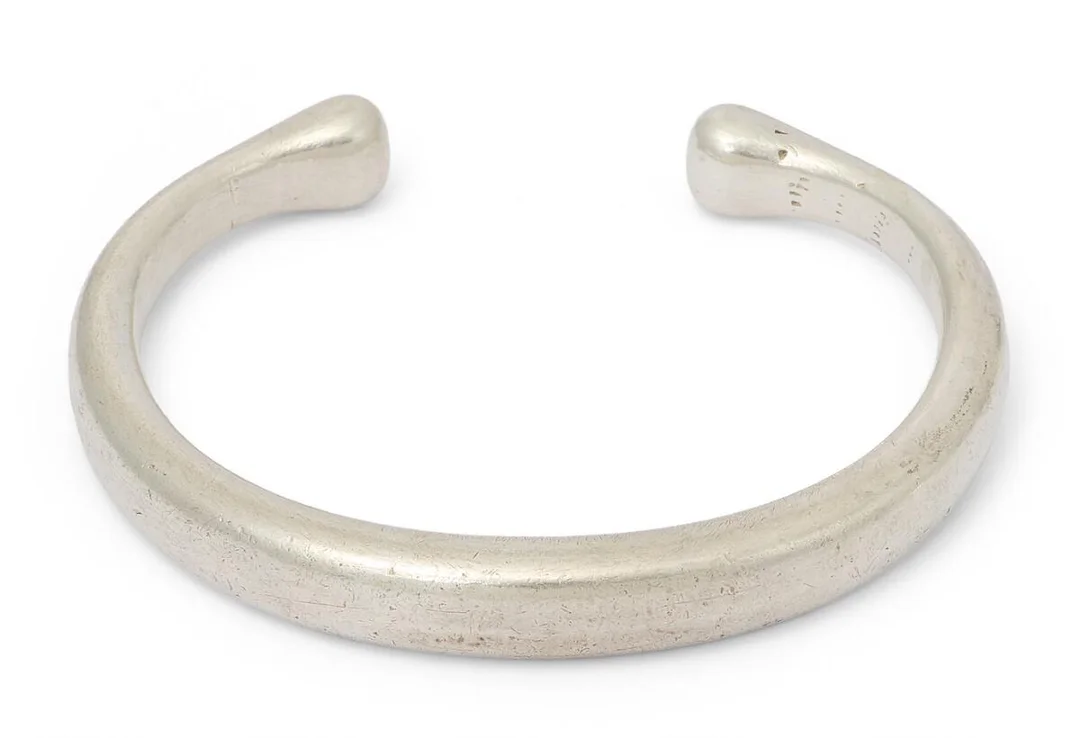 A bangle of sterling silver. Design no. 251. W. 9 mm. L. 20 cm. Georg Jensen after 1945. — Jewellery/Bracelets — Bruun Rasmussen