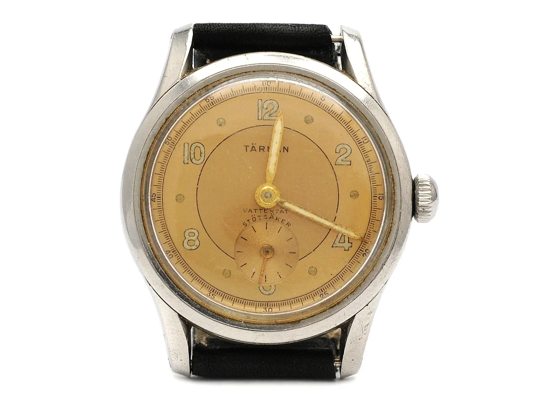 TÄRNAN, herrur, 32,5 mm, stål, manuell, plexiglas, liten sekundvisare, skadad urtavla, läderband, ca 1957. — Klockor/Tärnan — Kaplans