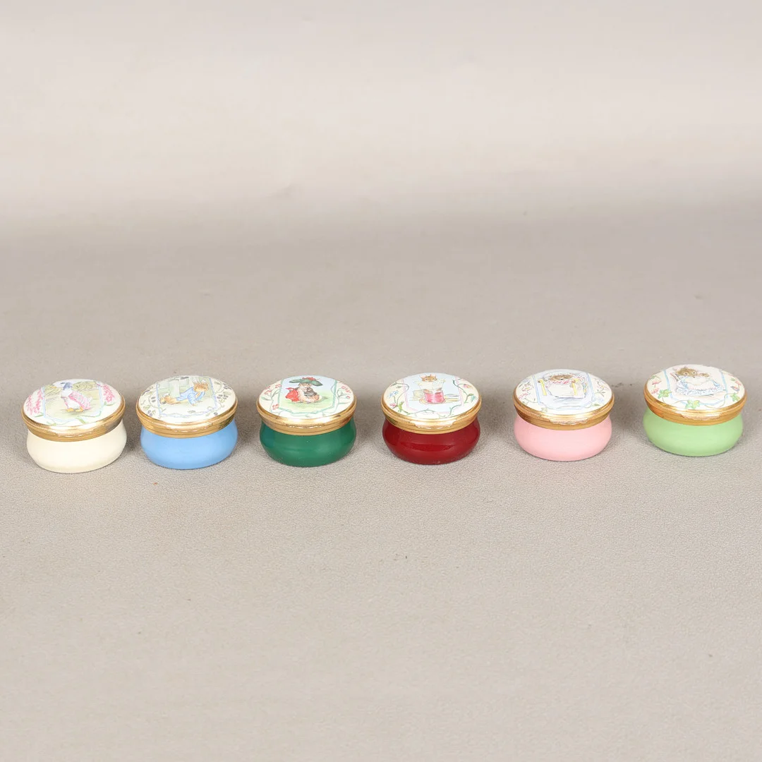 SIX CRUMMLES, BEATRIX POTTER ENAMEL BOXES EXCLUSIVELY COMMISSIONED FOR ROYAL DOULTON (6). — Other collectables — Bishop & Miller