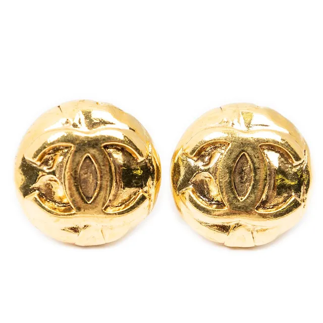 A pair of ear clips in gold-toned metal each set with a CC logo. Weight app. 7.9 g. Diam. app. 2 cm. (2)