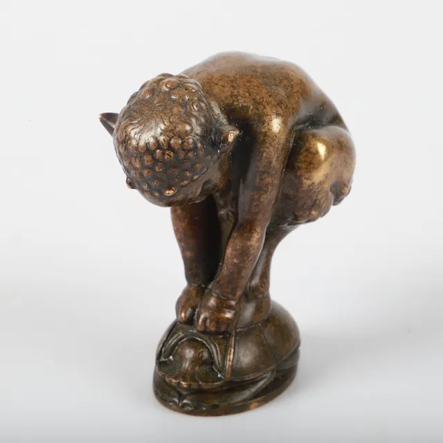 SIGILL, brons i form faun.