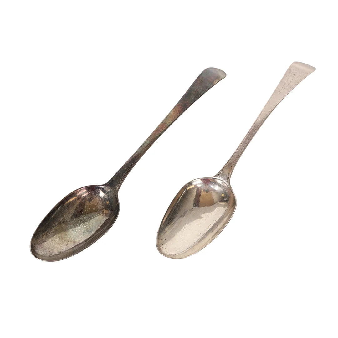 A PAIR OF GEORGE III SILVER DESERT SPOONS (2). — Silver — Bishop & Miller