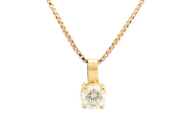 ENSTENSHÄNGE/KEDJA, 18K guld, briljantslipad diamant ca 0,40 ct, ca Ca/SI, längd 42 cm, vikt 3,0 g, diamanten har litet nagg på kuletten.