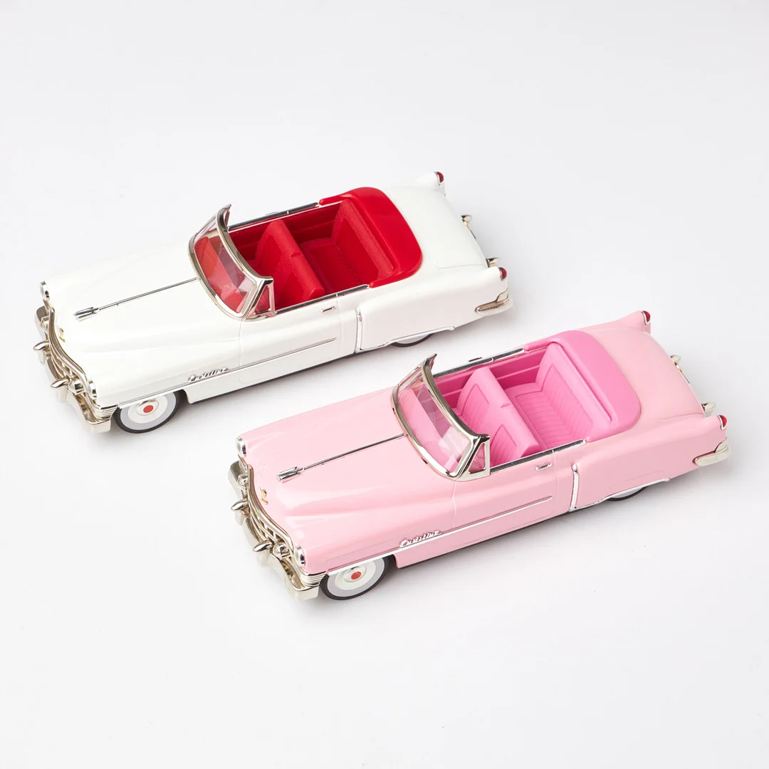MODELBILAR, 2 st, "Cadillac Open" Type 1950, Fifties, lackerad plåt, Japan, i originalkartonger. — Toys — Stockholms Auktionsverk Sickla