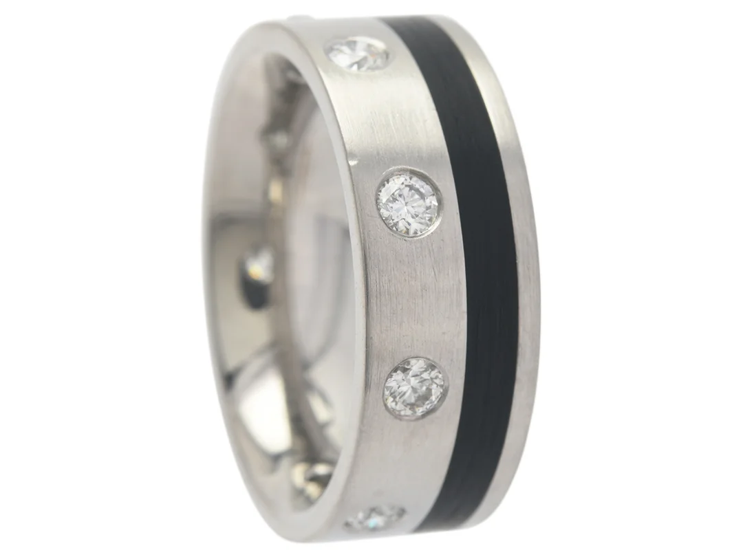 RING, titan/plast, 9 briljantslipade diamanter ca 0,40 ctv, ca TW-W(G-H)/VS, stl 15,5 mm. — Smycken/Ring — Kaplans