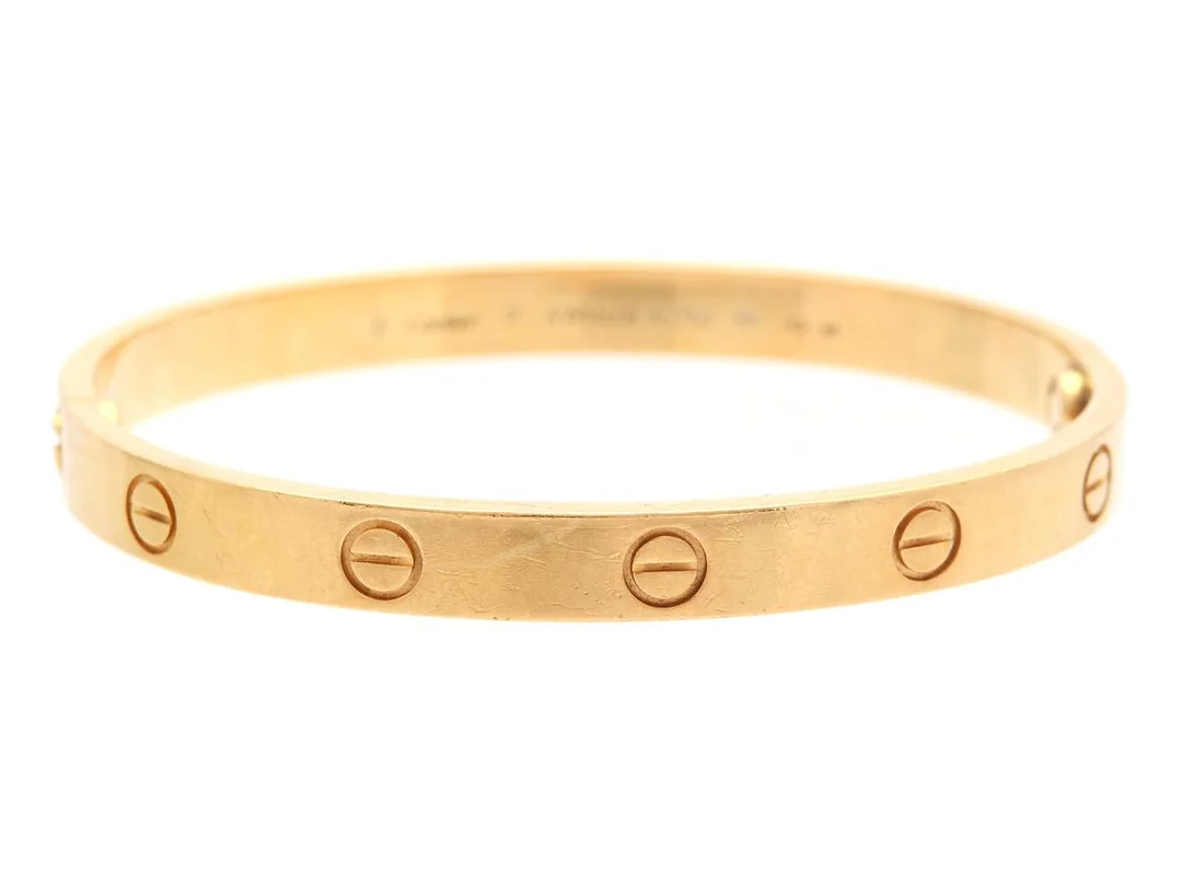 CARTIER, armband, 18K guld, Love bracelet, stl 17, vikt 32,1 g, ref nr AWM408, etui, resekit, skruvmejsel. — Smycken/Armband — Kaplans