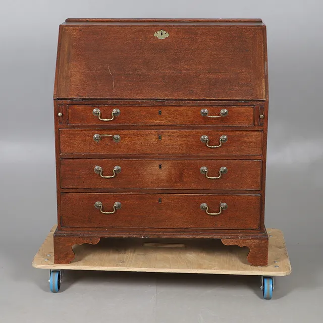 A GEORGE III OAK FALL FRONT BUREAU.