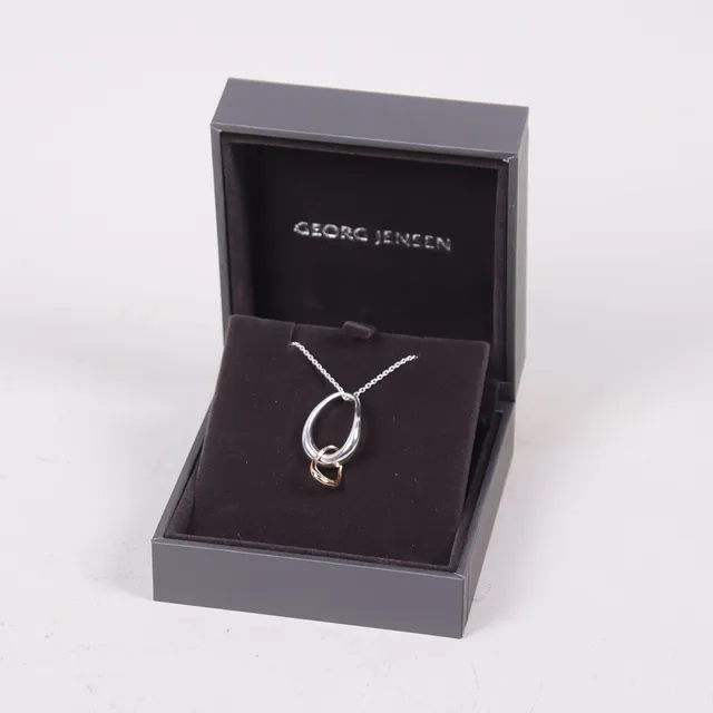 JACQUELINE RABUN. för Georg Jensen, "Offspring", silverhalsband med hängsmycke i silver och 18k roséguld.