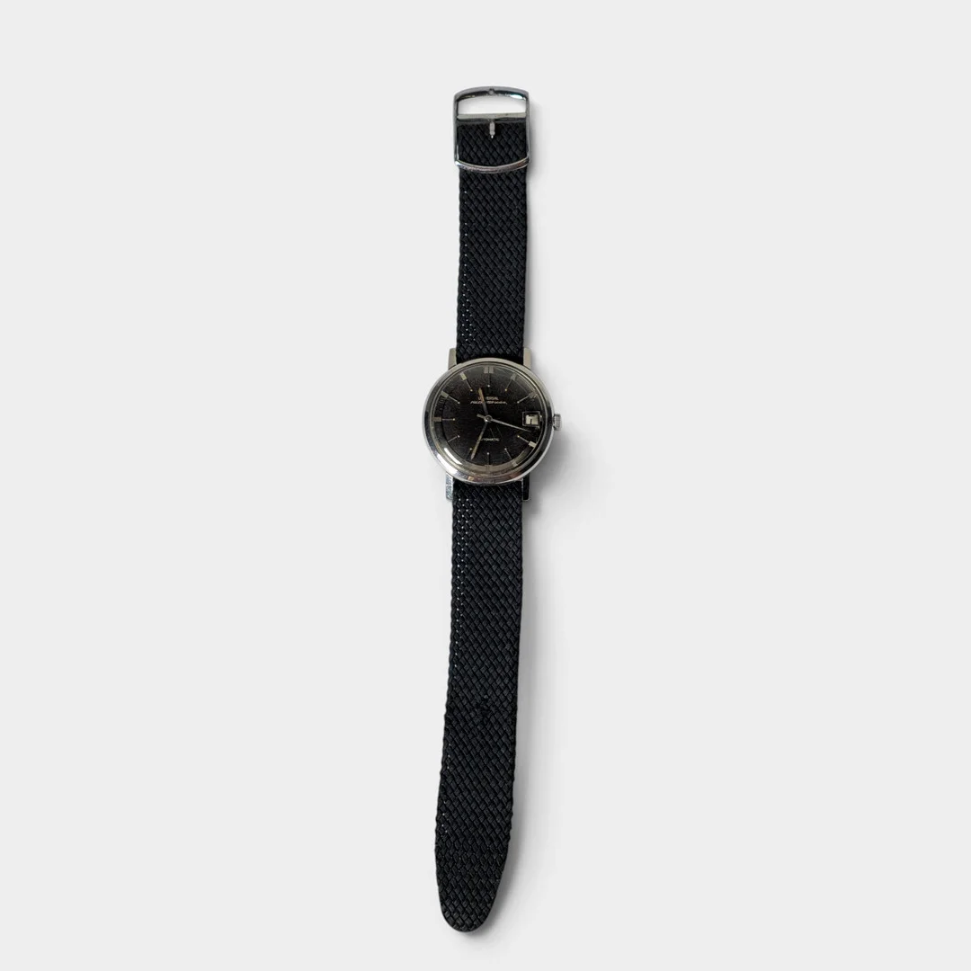 UNIVERSAL GENÈVE. Reloj de pulsera «Polerouter». — Wristwatches — Barcelona Auctions