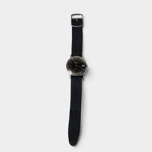 UNIVERSAL GENÈVE. Reloj de pulsera «Polerouter».