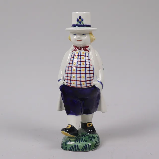 HERLUF JENSENIUS. Aluminia, Danmark, figurin "Børnehjælpsfigur" i fajans, Bondeknøs Hans 1948.