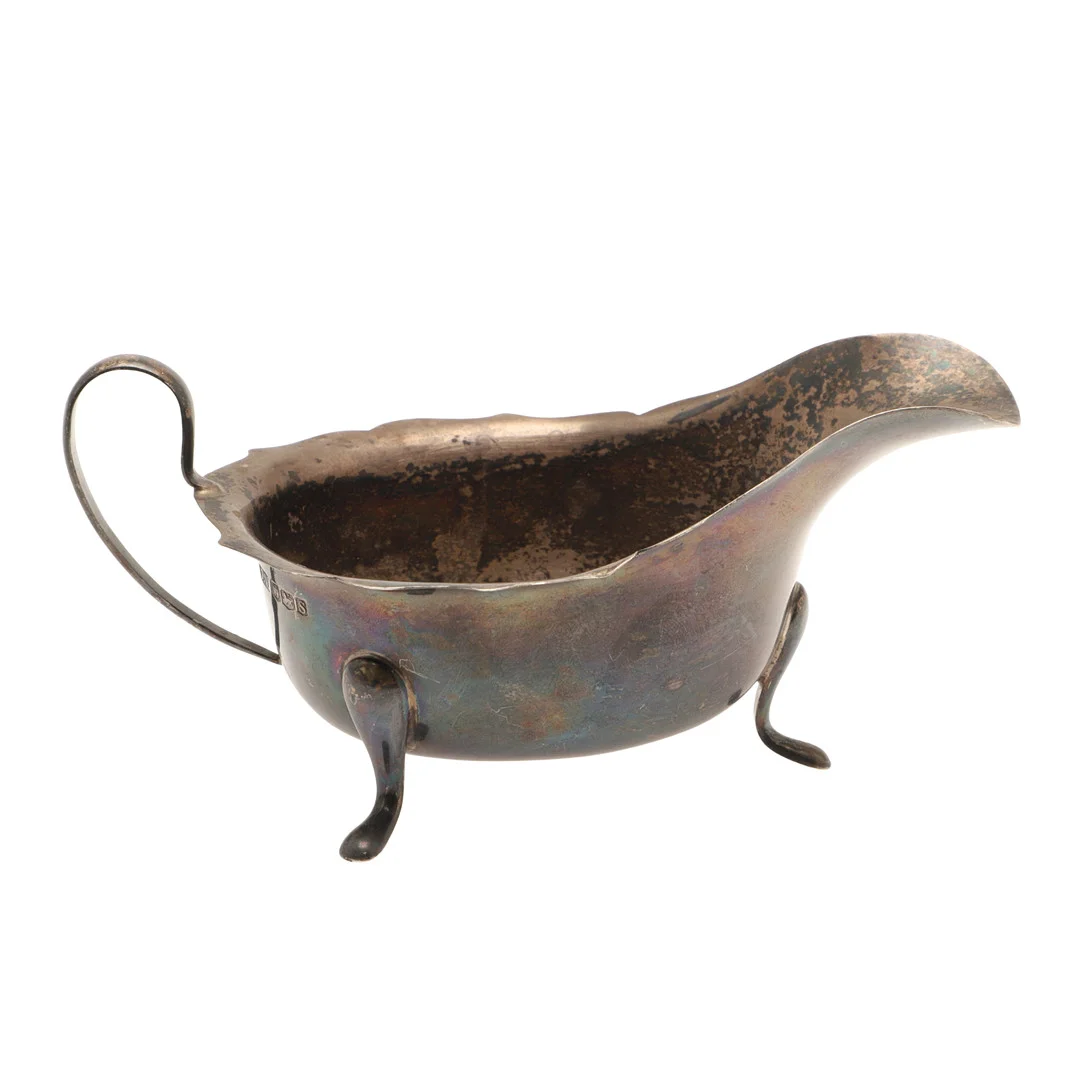 AN EARLY 20TH CENTURY SILVER SAUCE BOAT. — Silver — Lawrences Auctioneers