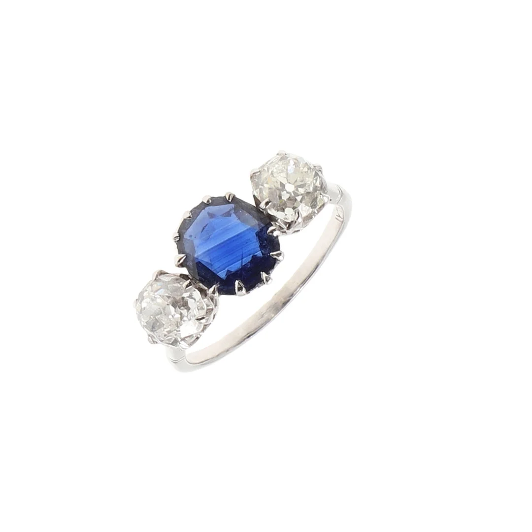 A SAPPHIRE AND DIAMOND THREE STONE RING. — Rings — Lawrences Auctioneers