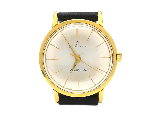 ETERNA-MATIC, Centenaire, Boett nr. 4485832, herrur, 34,5 mm, doublé (80 micron), automatisk, plexiglas, skadad urtavla, skadad boett, läderband, ca 1960.