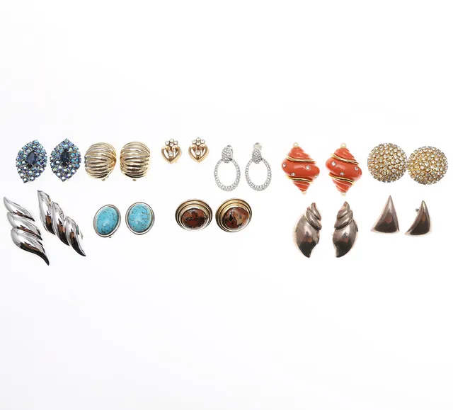 Eleven pairs of vintage and contemporary costume jewellery earrings.