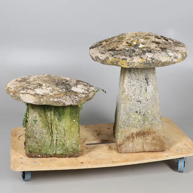 TWO STADDLE STONES.