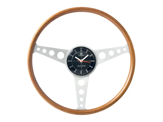 TISSOT, Electronic, väggur i form av en ratt, 298 mm, batteridriven, plexiglas, ca 1978.