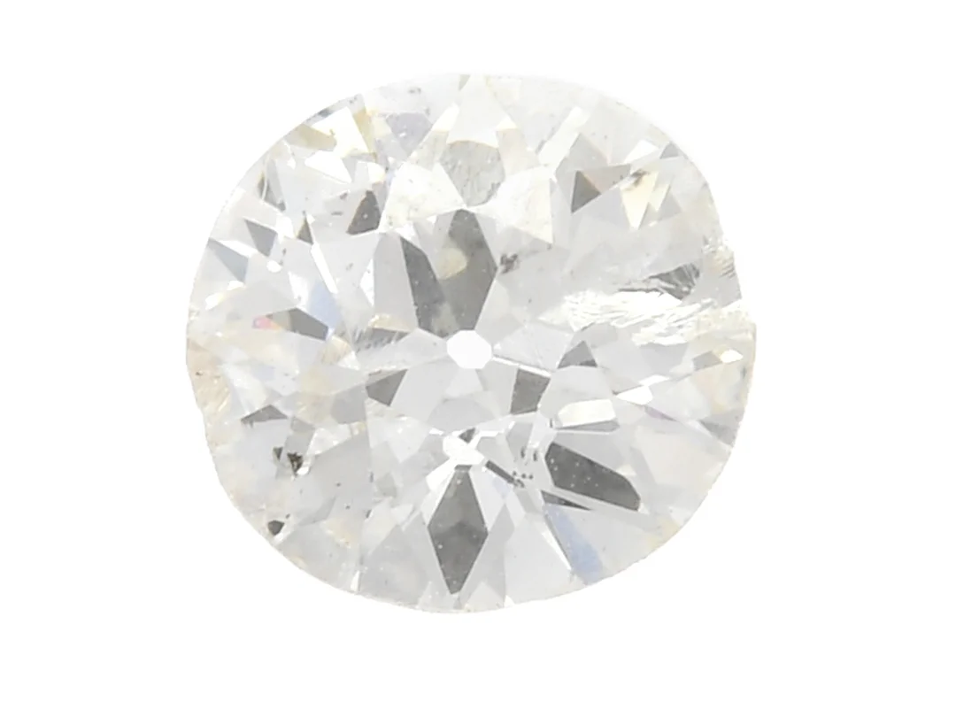 DIAMANT, gammalslipad, 0,86 ct, TCa(K)/SI2, brun ton, stor skada på kronan och nagg på rondisten i anslutning till en inneslutning som når ytan på paviljongen. — Ädelstenar/Diamanter — Kaplans