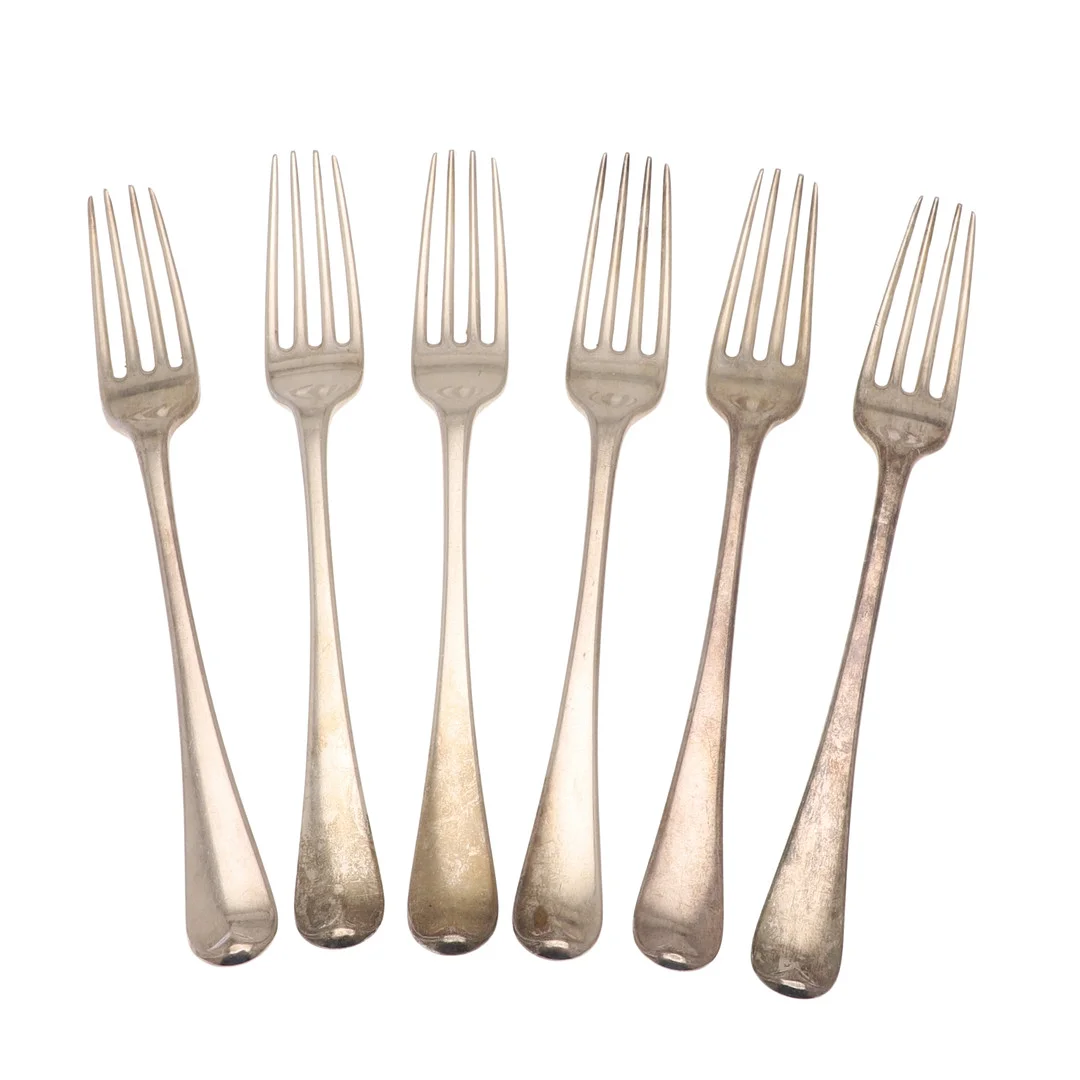 A SET OF SIX GEORGE III SILVER OLD ENGLISH PATTERN DINNER FORKS. — Silver — Lawrences Auctioneers