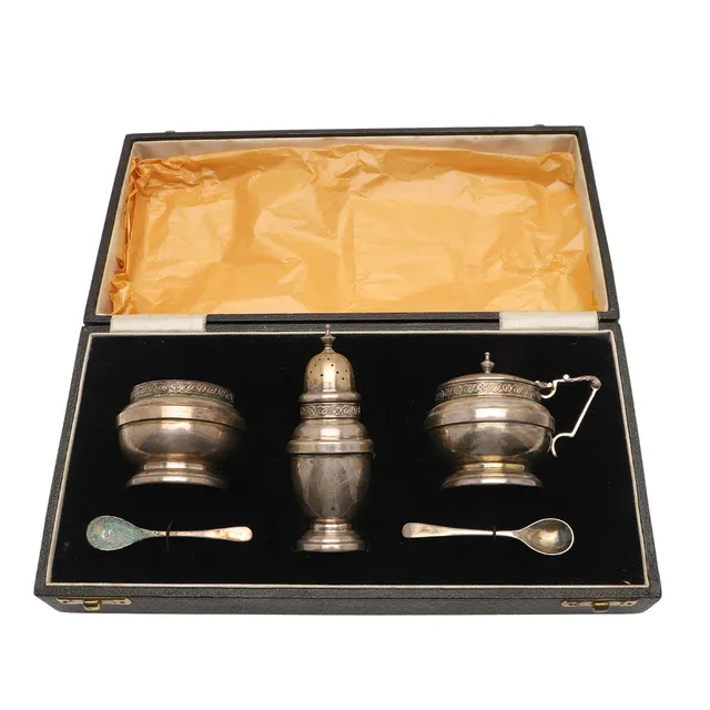 CASED SILVER CONDIMENT SET.