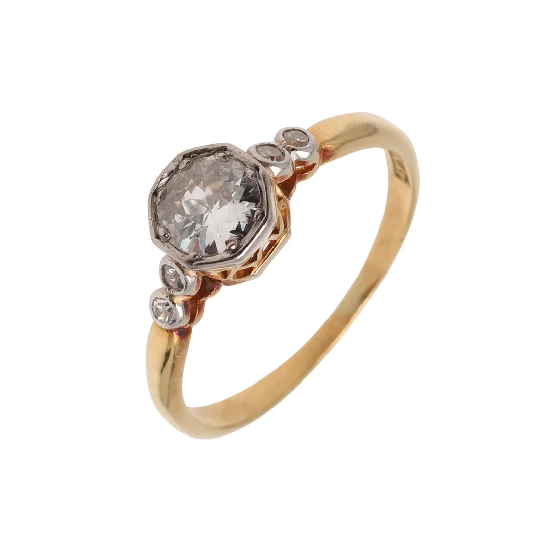A DIAMOND SOLITAIRE RING SET IN 18CT YELLOW GOLD AND PLATINUM. — Rings — Lawrences Auctioneers