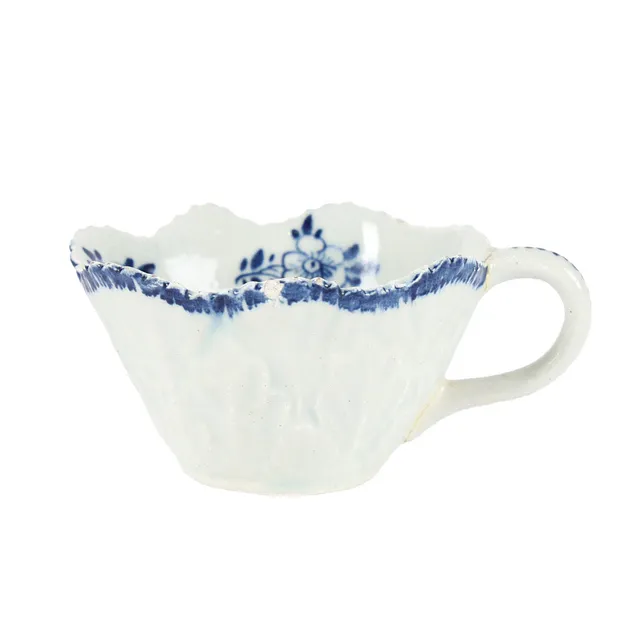 A BOW BLUE AND WHITE BUTTER BOAT, CIRCA 1765.