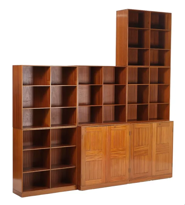 Two solid mahogany cabinets, five bookcases and three plinth. Made and partly marked by Rud. Rasmussen cabinetmakers. H. 76. W. 76. D. 36 and H. 76. W. 76. D. 27.5 cm. (10)